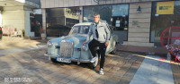 Николай